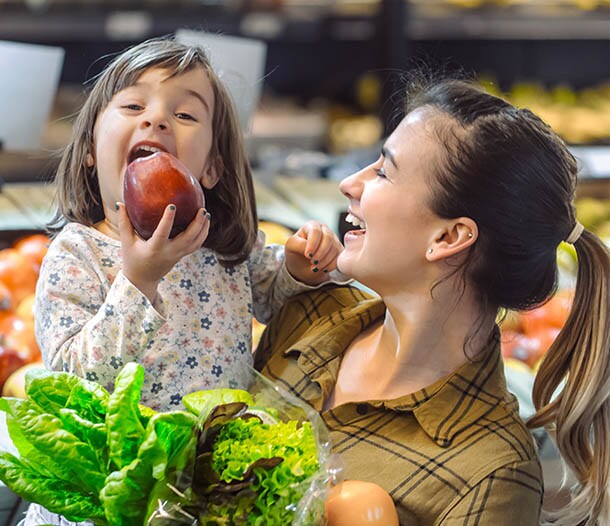 Mother and child grocery shopping